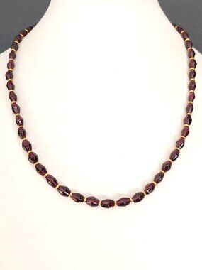 Purple glass beaded necklace with gold accents